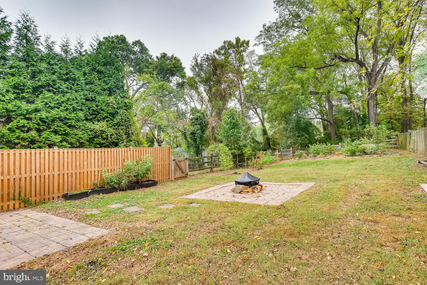 5723 Pimlico Road Baltimore, MD 21209 - Photo 23 of 25 Fire pit area and landscaped rear gardens