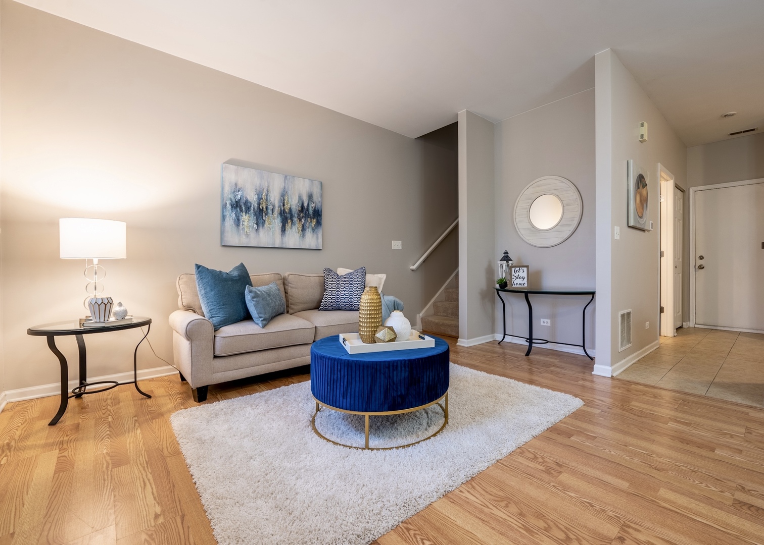 159 Springbrook Trail South Oswego, IL 60543 - Photo 12 of 32 a living room with furniture and a wooden floor
