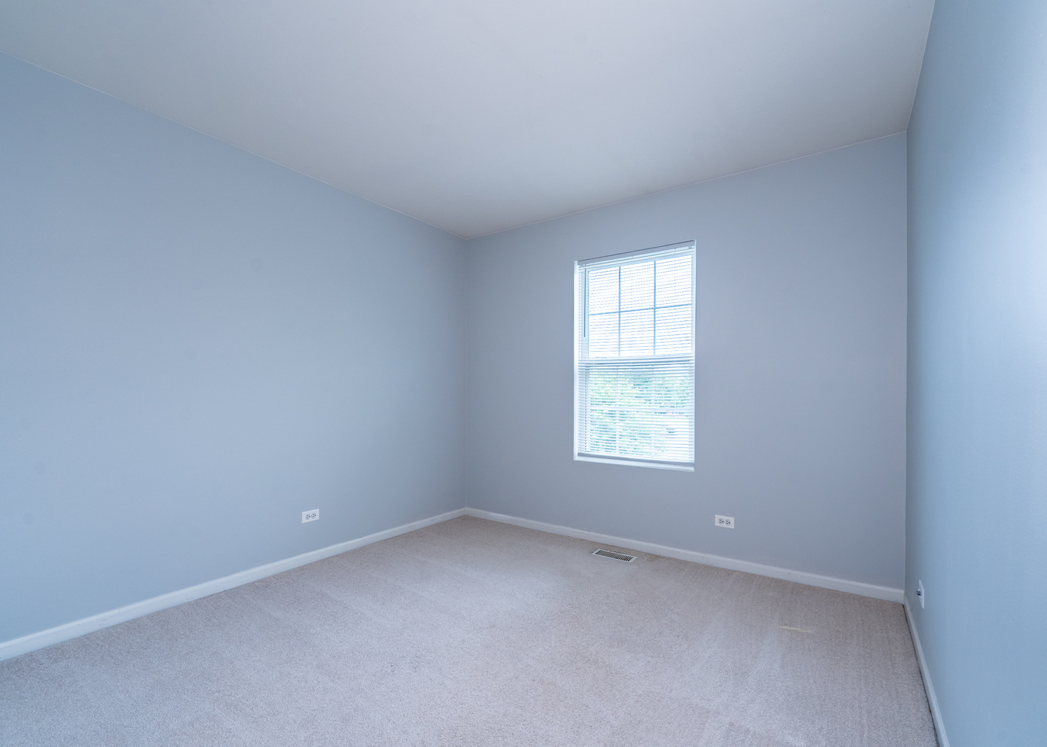 159 Springbrook Trail South Oswego, IL 60543 - Photo 21 of 32 an empty room with a window