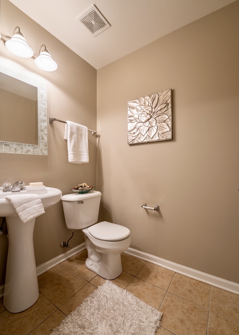 159 Springbrook Trail South Oswego, IL 60543 - Photo 29 of 32 a bathroom with a toilet sink and mirror