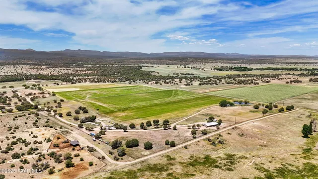 a view of a pool with a terrace