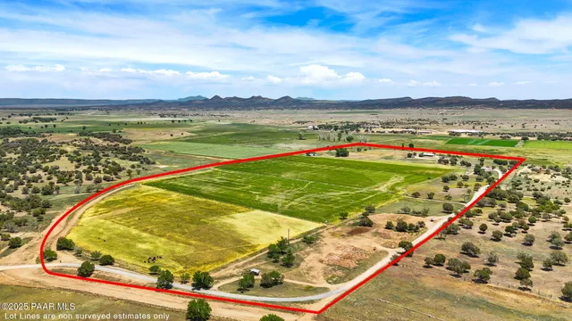 swimming pool with an outdoor seating yard and mountain view in back