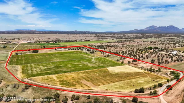 a view of a swimming pool with an ocean view