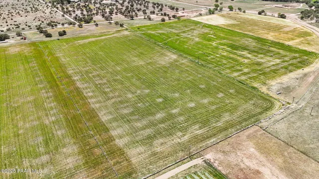 a view of a lake with a big yard