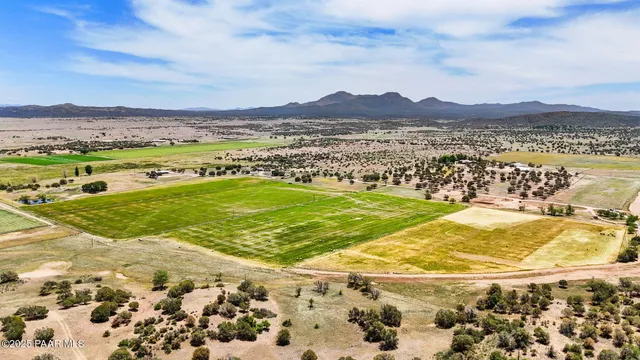 a view of an ocean and a mountain