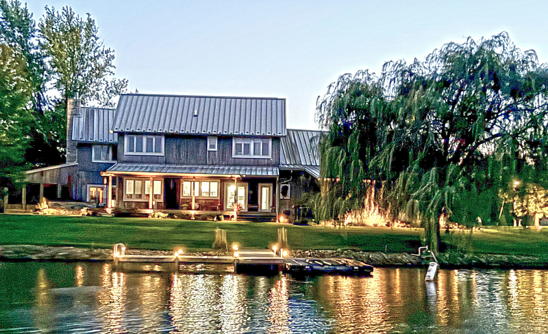 118 Pima Lane Loda, IL 60948 - Photo 2 of 50 a view of a house with a yard and a lake view