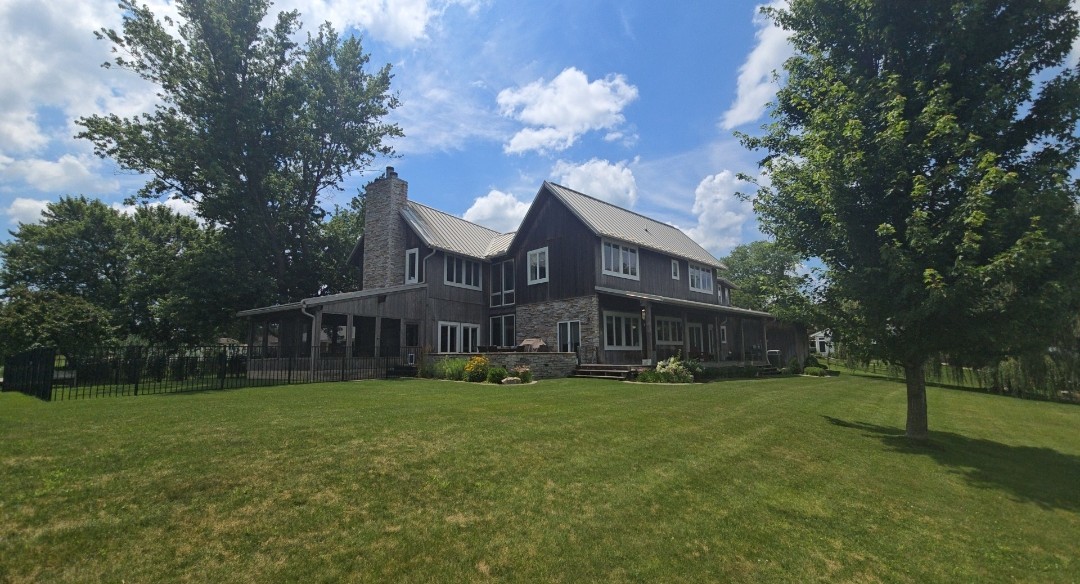118 Pima Lane Loda, IL 60948 - Photo 3 of 50 a view of a house next to a big yard and large trees
