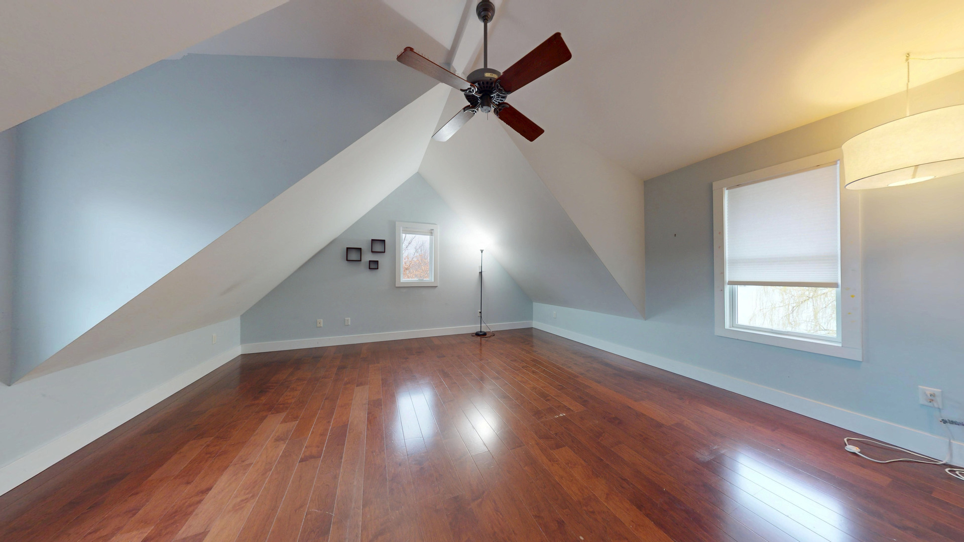 118 Pima Lane Loda, IL 60948 - Photo 35 of 50 an empty room with wooden floor fan and windows