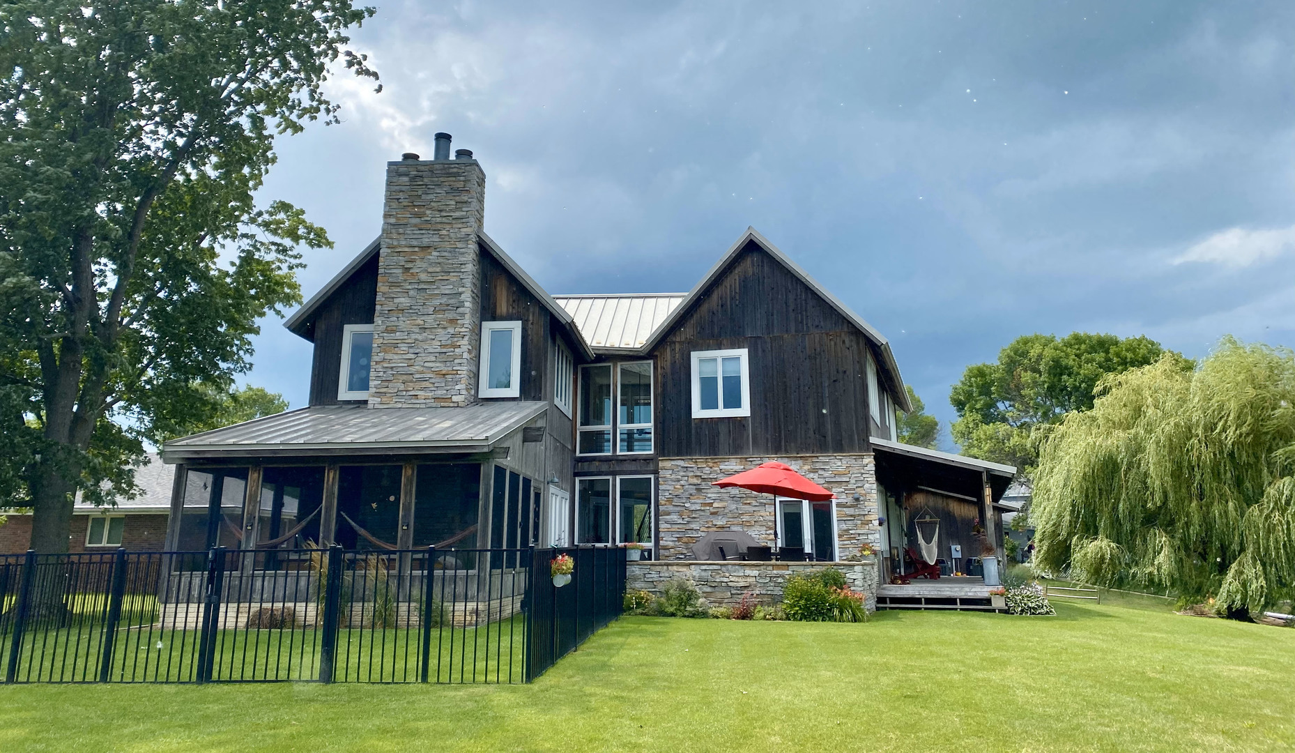 118 Pima Lane Loda, IL 60948 - Photo 40 of 50 a front view of a house with a yard table and chairs