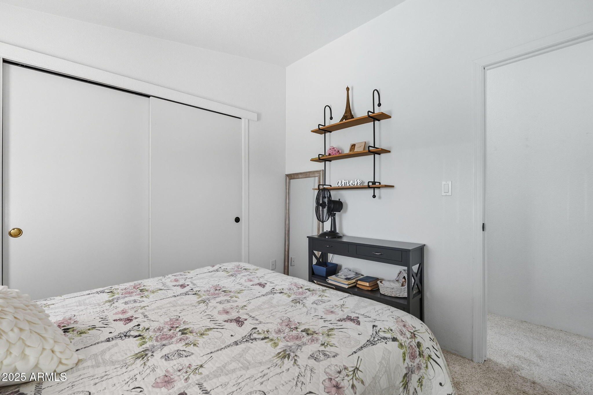 3700 South Tomahawk Road, Unit 39 Apache Junction, AZ 85119 - Photo 32 of 53 a bedroom with a bed and cabinets