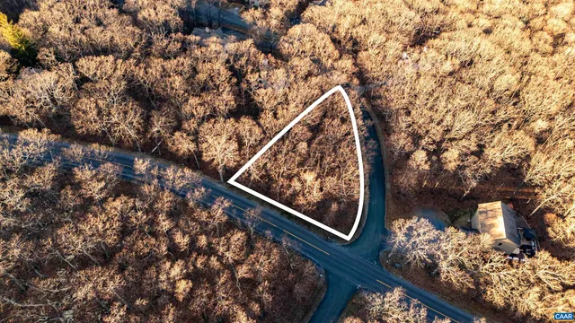 a view of a yard from a balcony