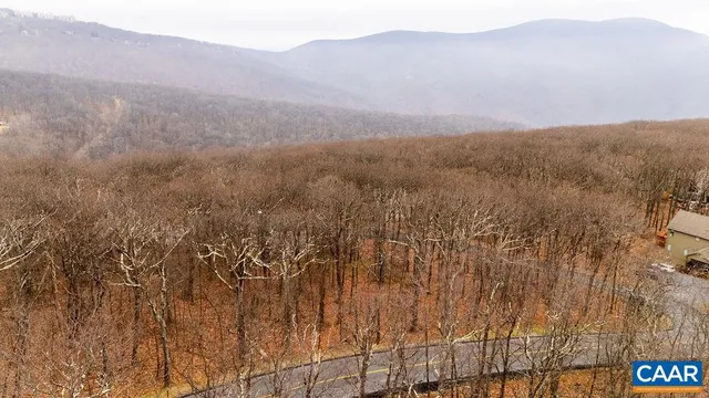 a view of mountains and valleys