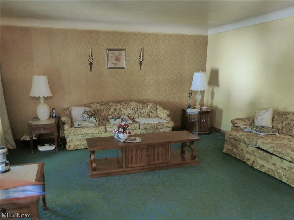 1814 Reyburn Road Cleveland, OH 44112 - Photo 2 of 11 Large Living room with hardwood under all carpet.