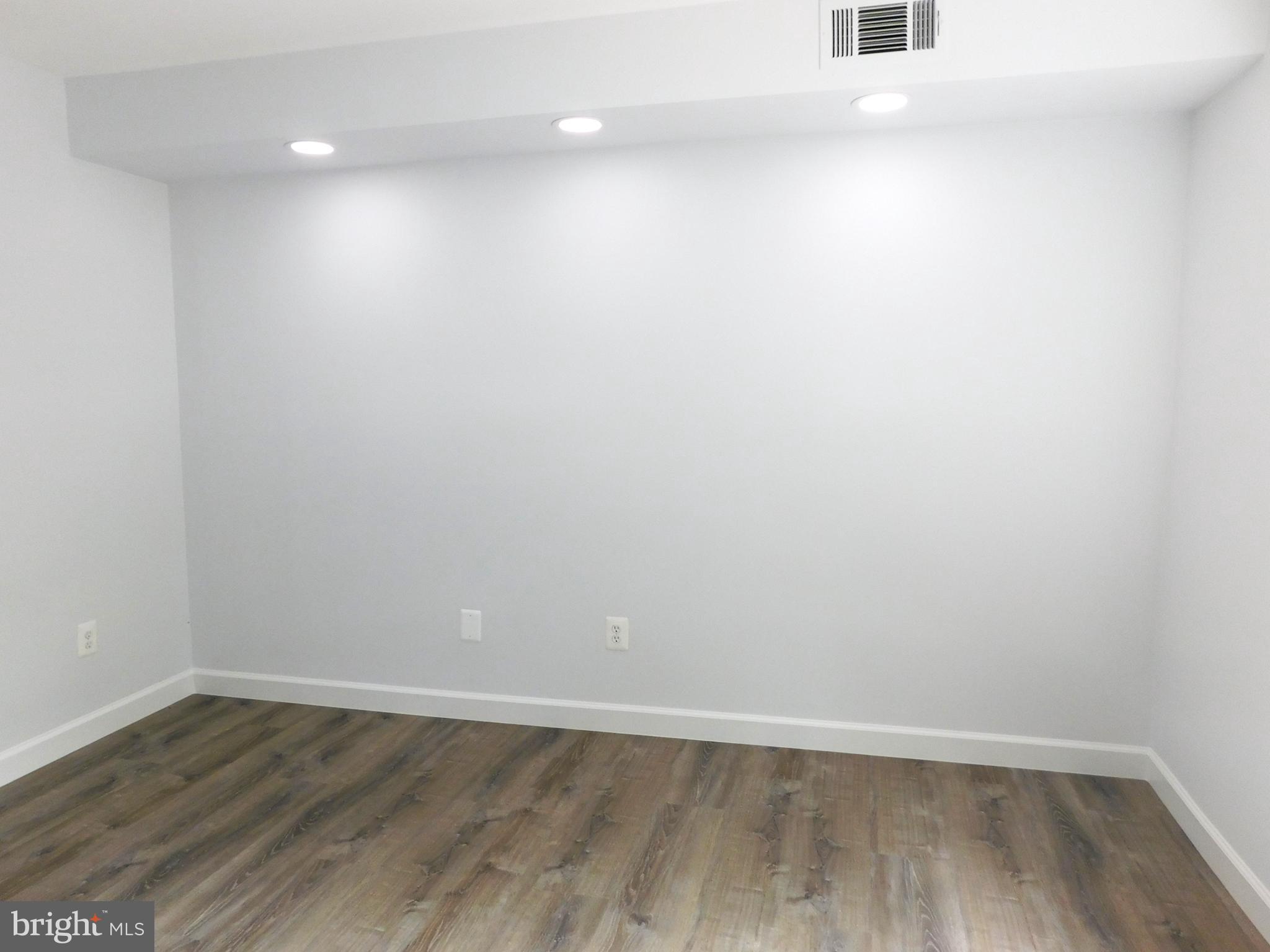 11601 Stoneview Square, Unit 11C Reston, VA 20191 - Photo 19 of 37 LVP flooring, new baseboards & controlled LED lite