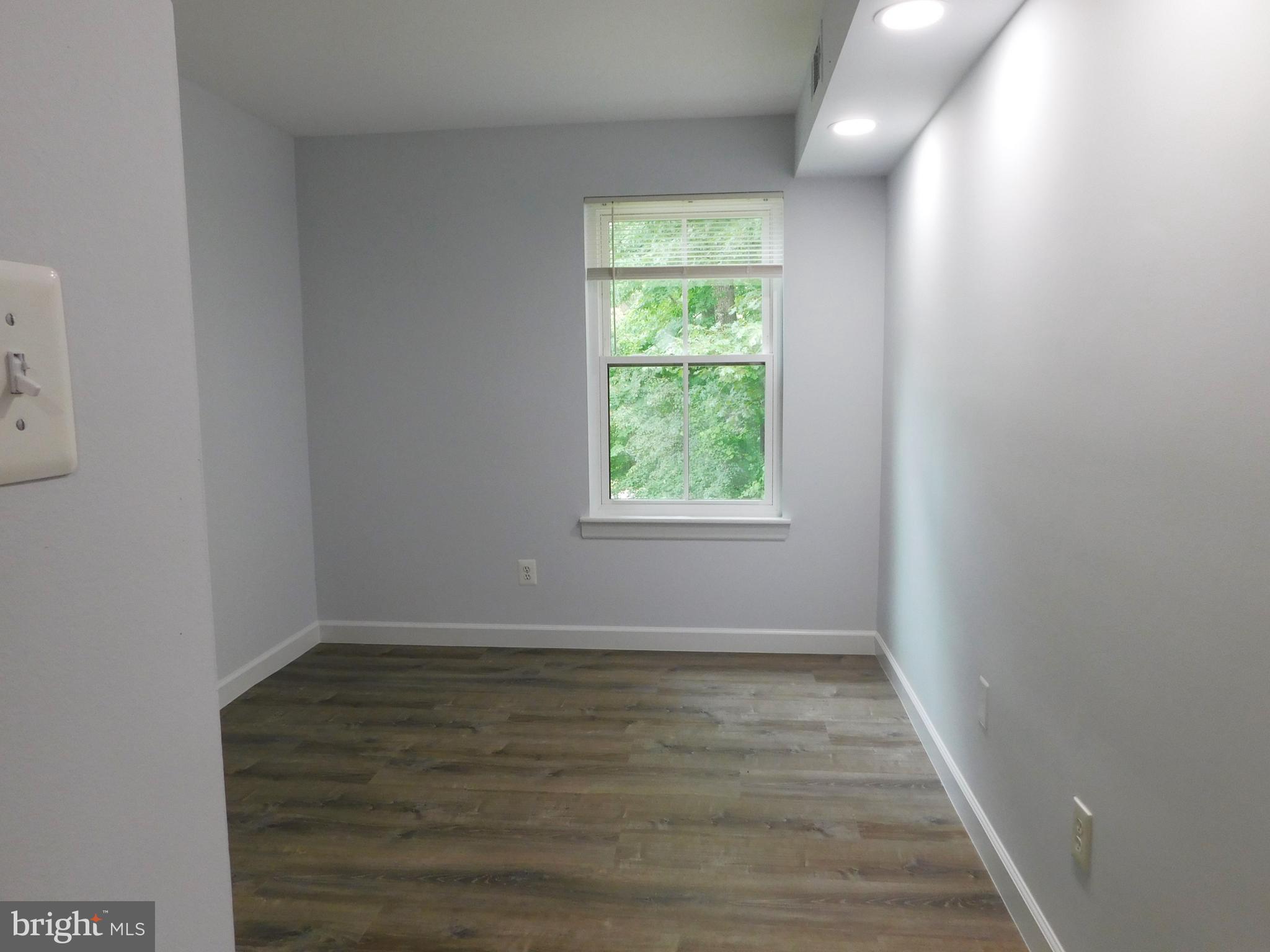 11601 Stoneview Square, Unit 11C Reston, VA 20191 - Photo 26 of 37 BR 3: LVP, recessed lites, 6 panel doors at closet