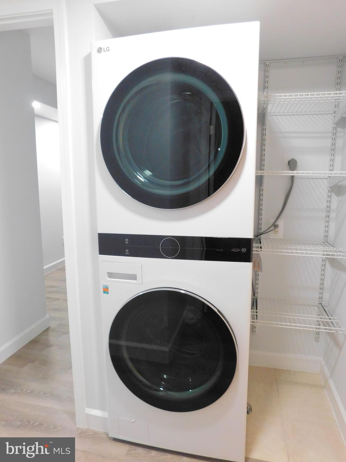 11601 Stoneview Square, Unit 11C Reston, VA 20191 - Photo 32 of 37 Upgraded LG washer & dryer has its own area