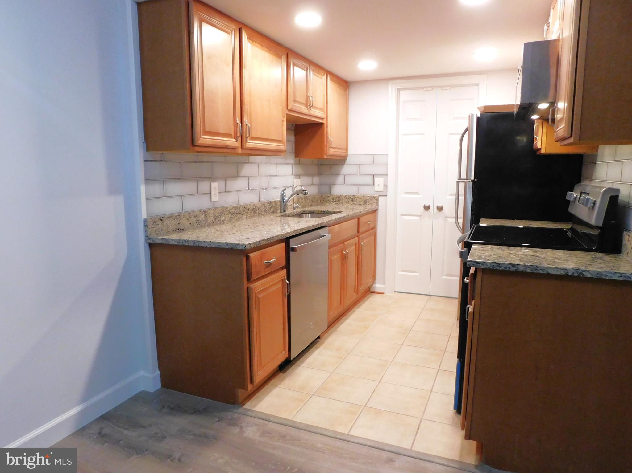 11601 Stoneview Square, Unit 11C Reston, VA 20191 - Photo 7 of 37 Newer SS appliances and LED recessed lighting