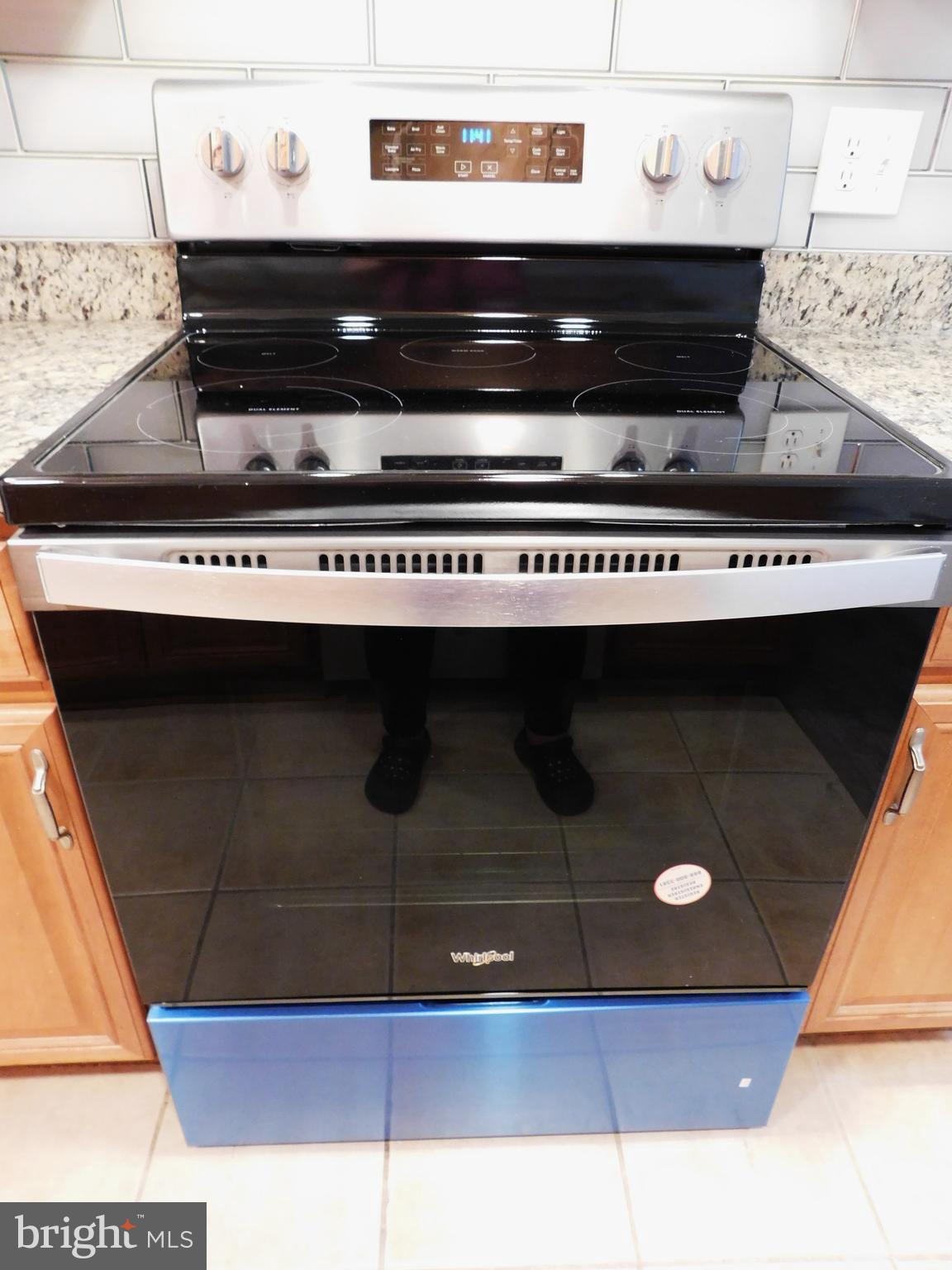 11601 Stoneview Square, Unit 11C Reston, VA 20191 - Photo 10 of 37 Never used - yet - SS and black WhirlPool range