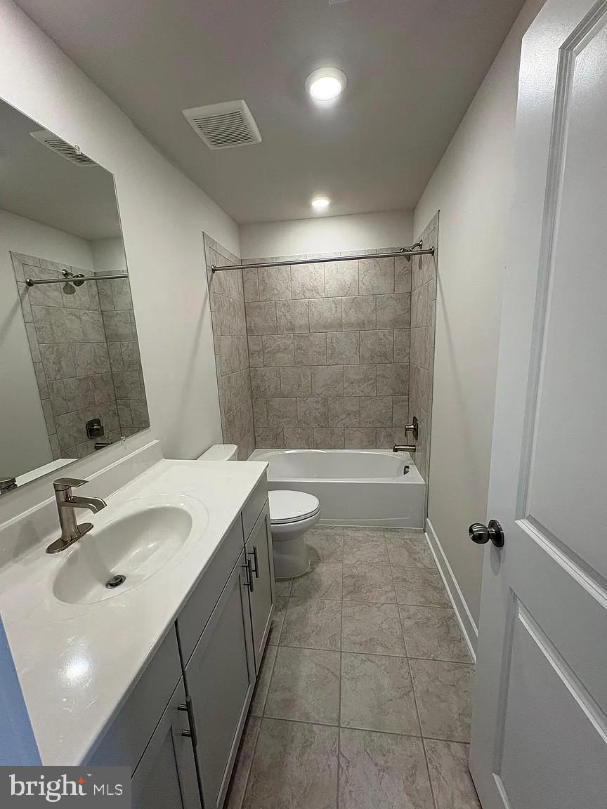 1759 Water Xing Road Baltimore, MD 21208 - Photo 9 of 15 a bathroom with a sink toilet and shower