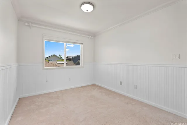 an entryway with a potted plant on th wall