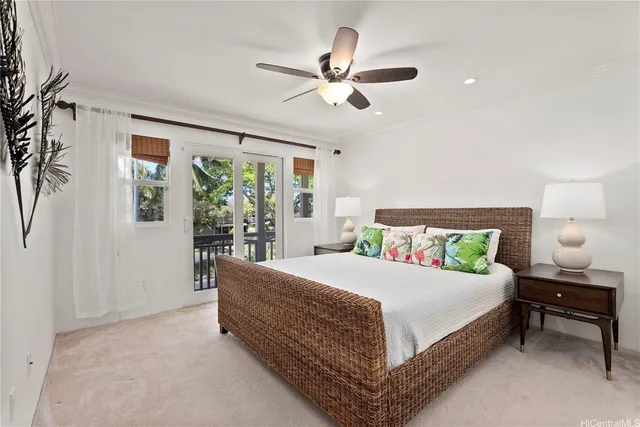 a bed room with a bed and a chandelier