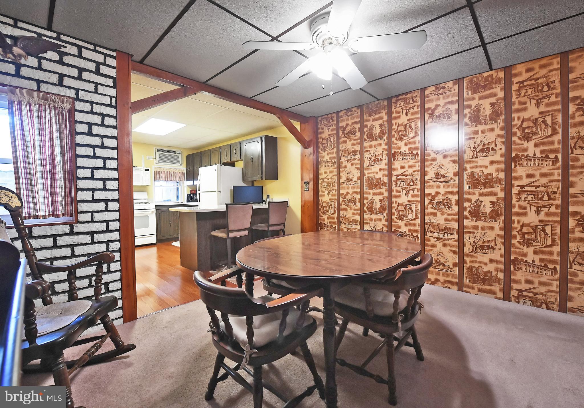 3516 Roland Avenue Baltimore, MD 21211 - Photo 11 of 23 Dining room open to kitchen