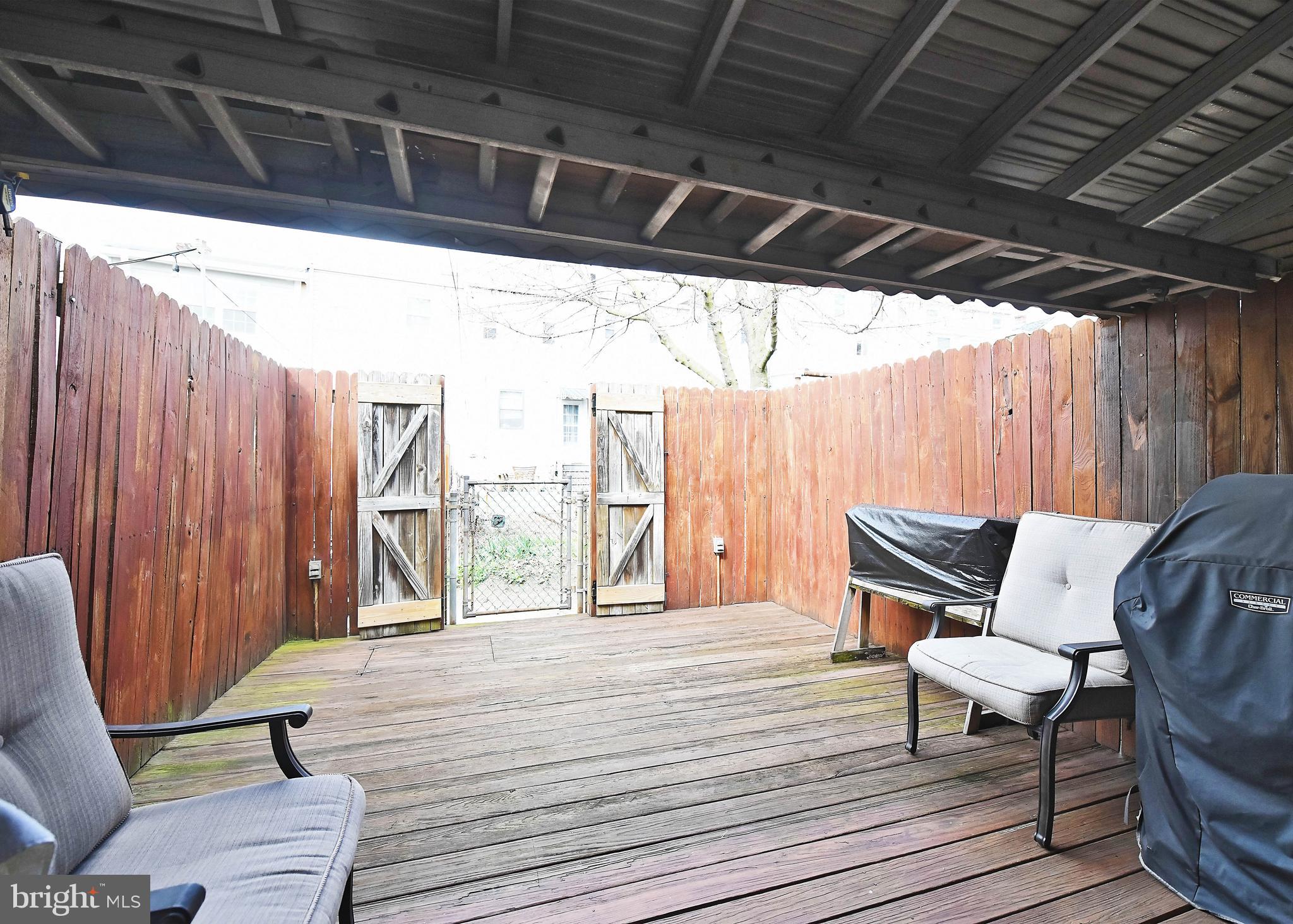3516 Roland Avenue Baltimore, MD 21211 - Photo 22 of 23 Garden deck with privacy at rear yard.