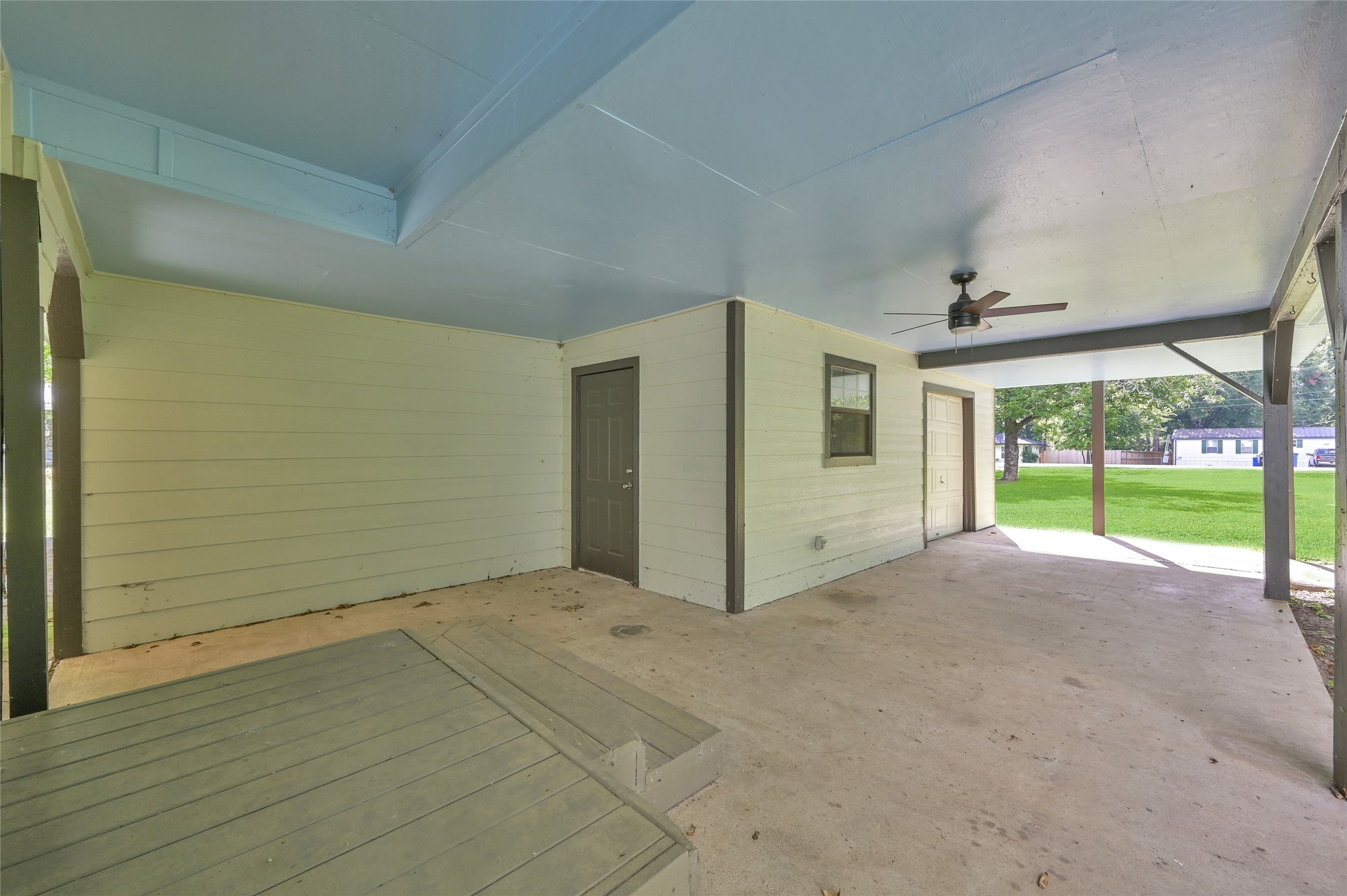 511 East Front Street New Waverly, TX 77358 - Photo 3 of 38 a view of a big room with wooden floor and windows