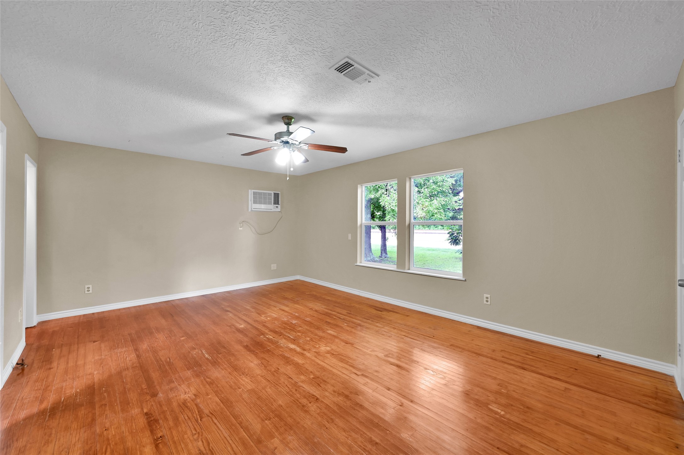 511 East Front Street New Waverly, TX 77358 - Photo 35 of 38 a view of an empty room with windows