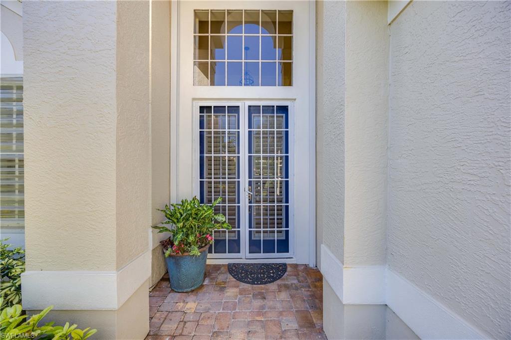 1936 Timarron Way Naples, FL 34109 - Photo 5 of 49 a view of front door of house