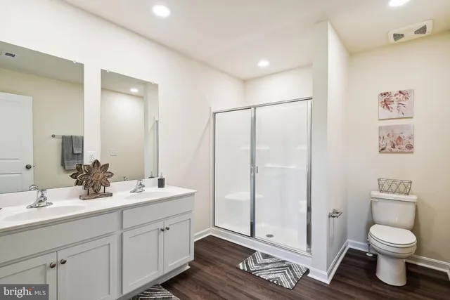 a bedroom with bed and a window