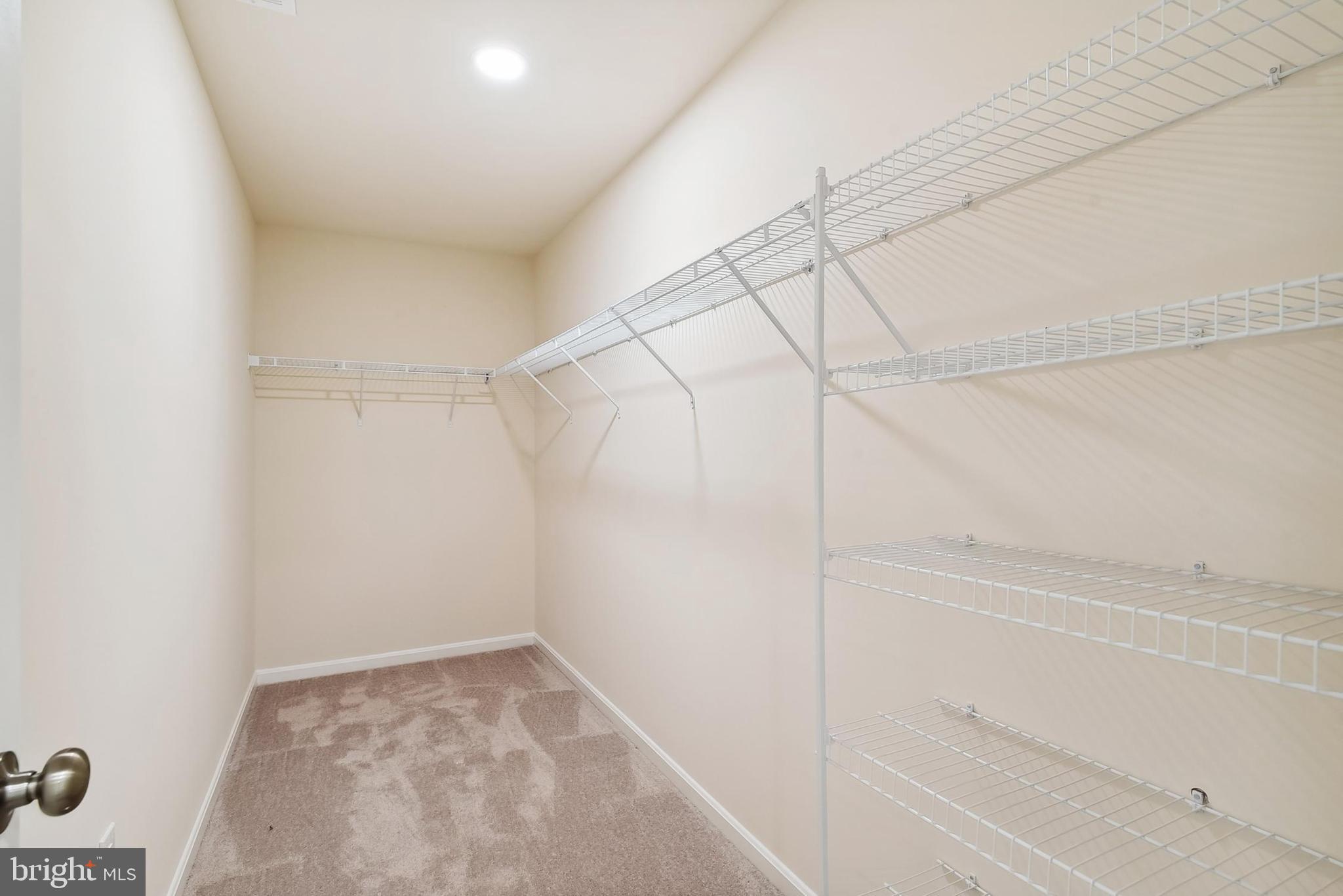 26571 Line Road Seaford, DE 19973 - Photo 17 of 26 a view of a room with racks on the wall