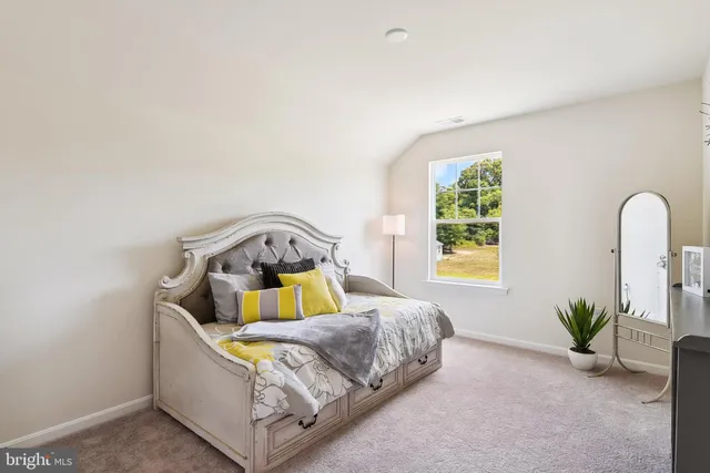 a view of a bedroom with cabinet bathroom and bathroom
