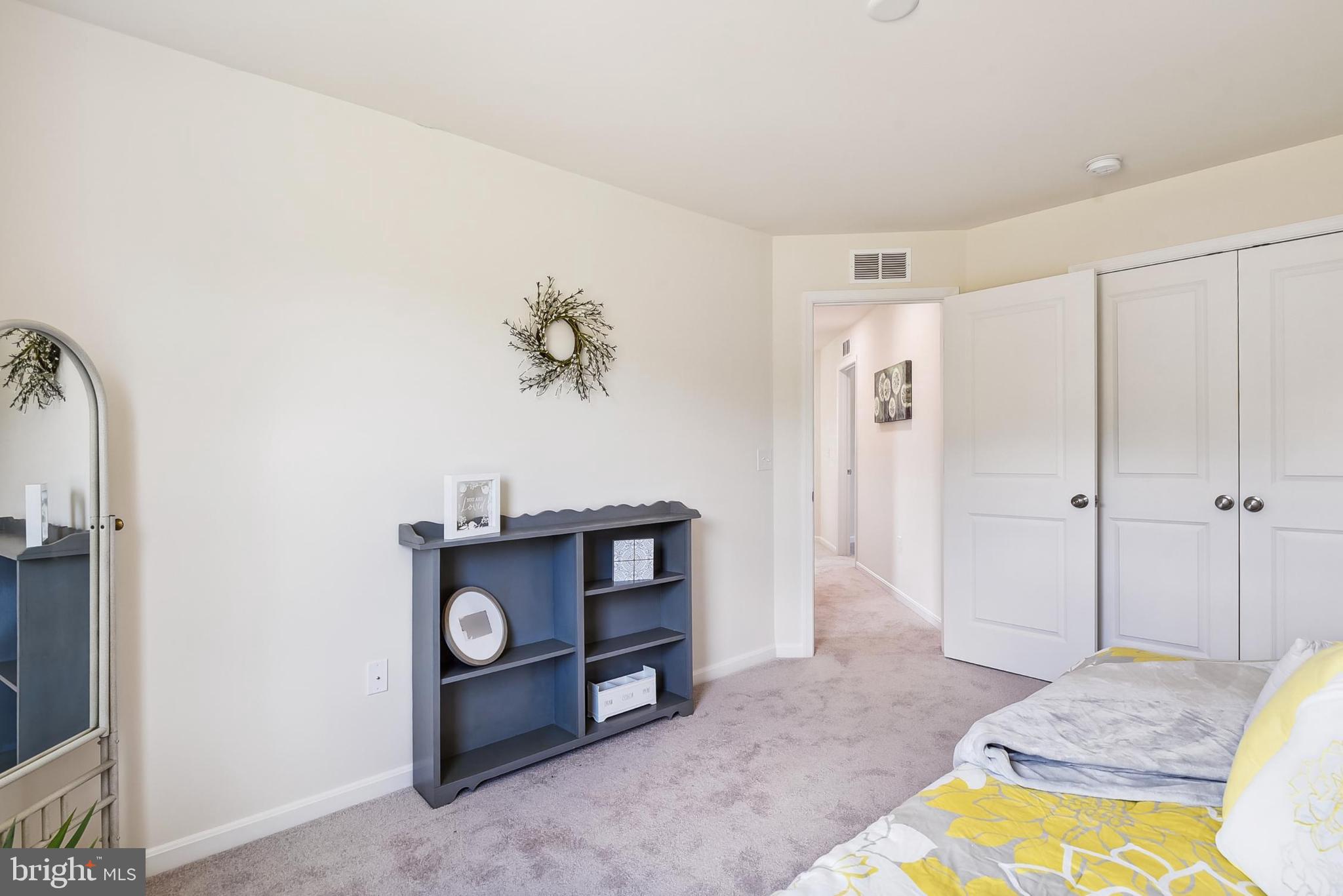 26571 Line Road Seaford, DE 19973 - Photo 23 of 26 a view of a bedroom with cabinet bathroom and bathroom