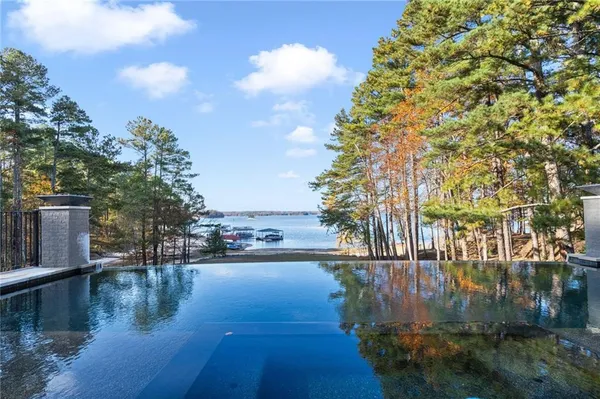 a view of a swimming pool with a lounge chairs