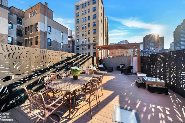 a view of a city with sitting area