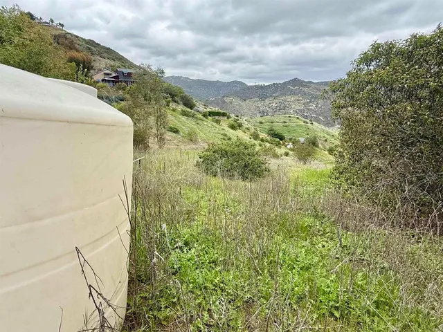 a view of a lake from a balcony