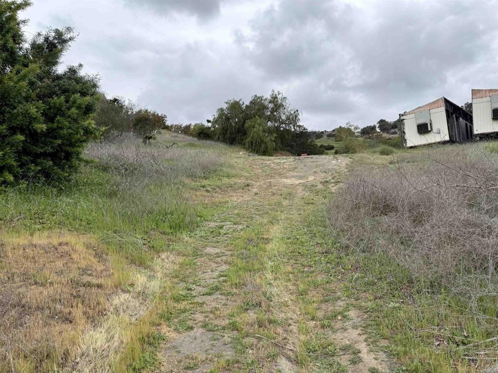 0 Alex Road Fallbrook, CA 92028 - Photo 27 of 29 a view of a dry yard with wooden fence