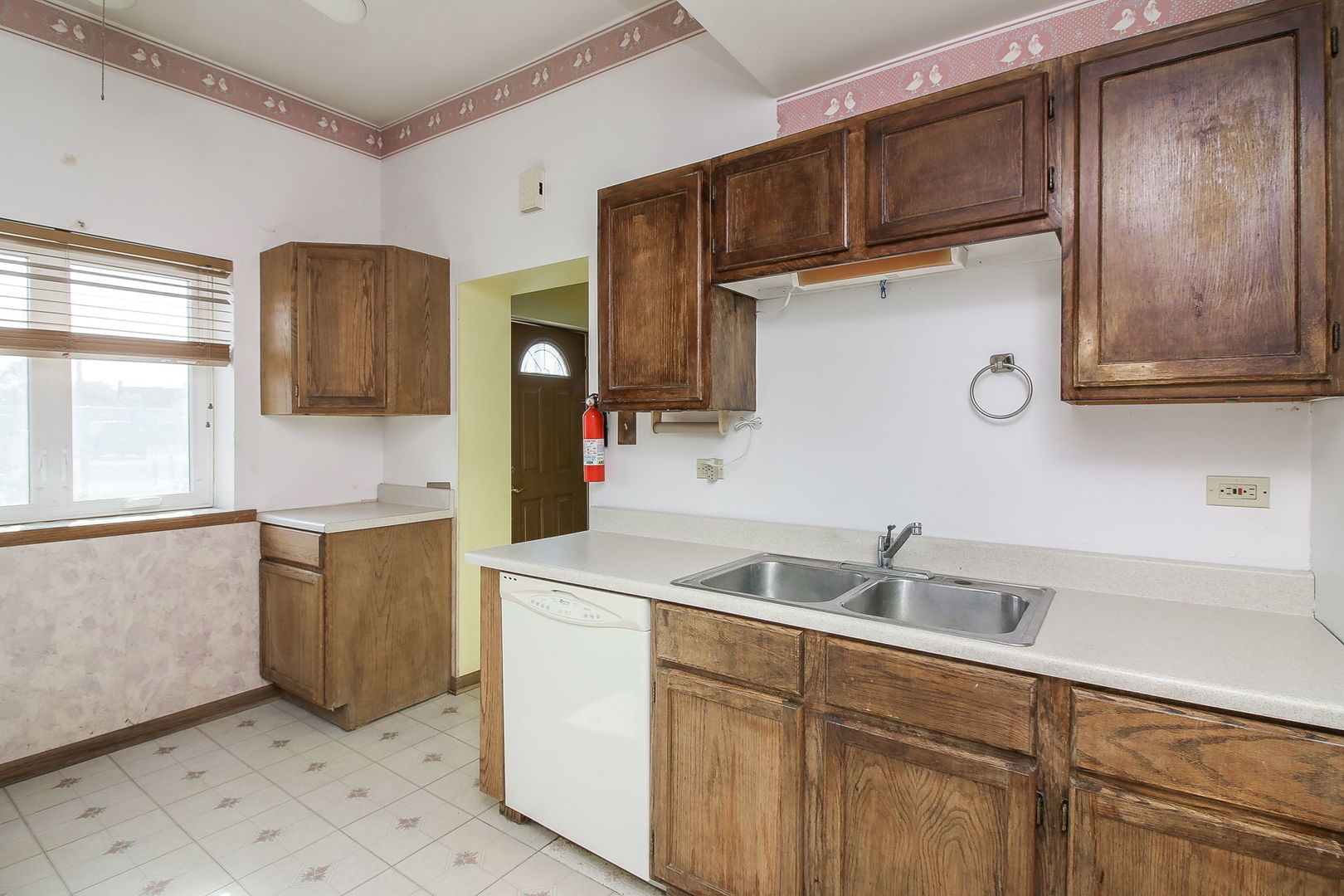 3848 Harrison Avenue Brookfield, IL 60513 - Photo 4 of 12 a kitchen with a sink and cabinets