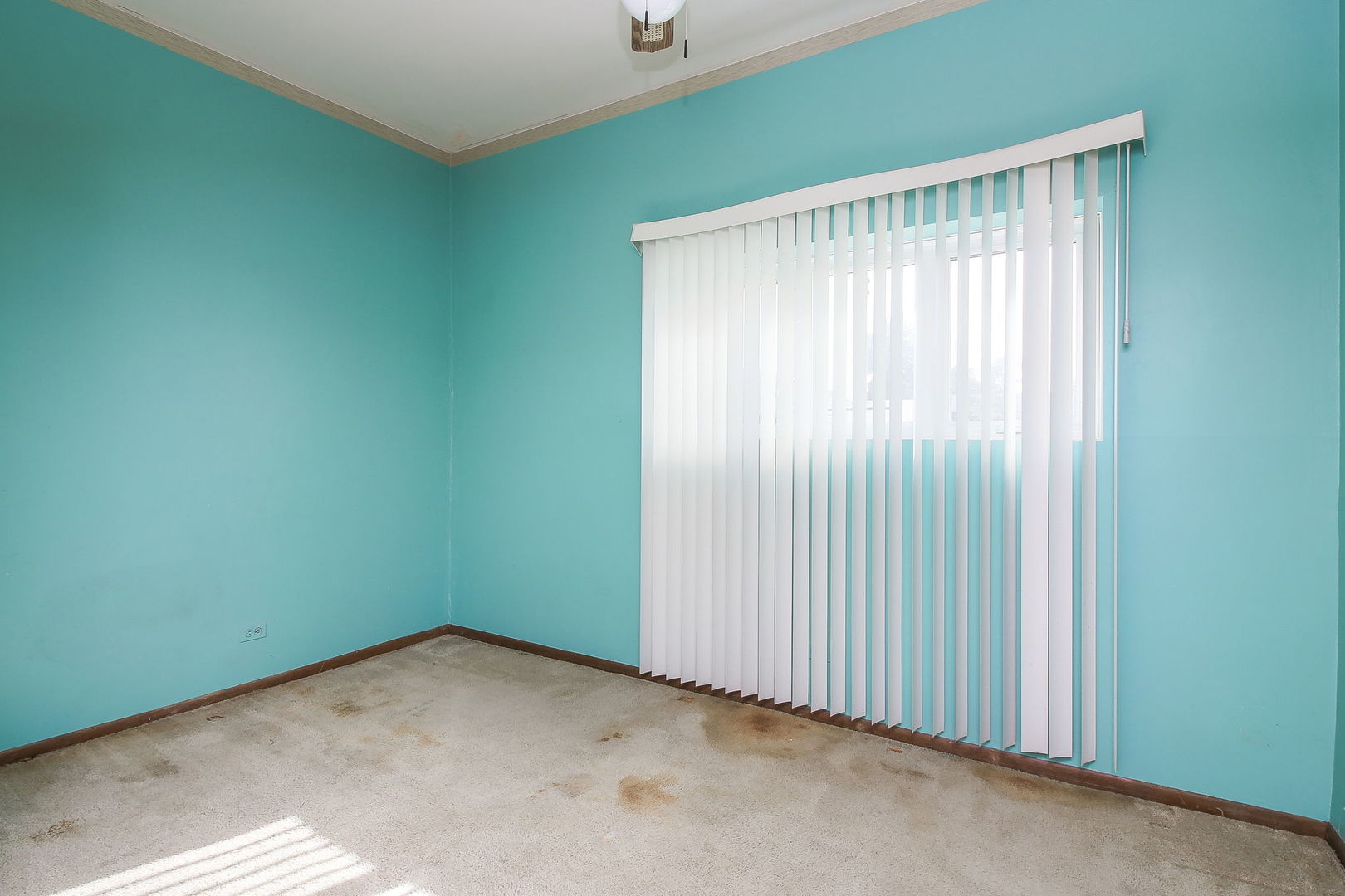 3848 Harrison Avenue Brookfield, IL 60513 - Photo 8 of 12 a view of an empty room with a window