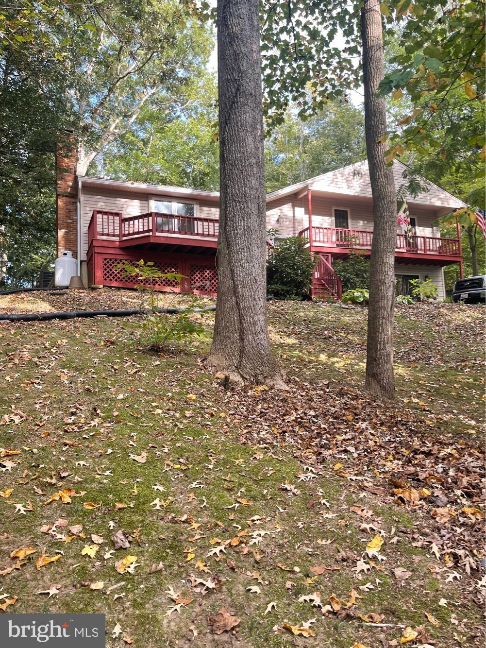 3330 Holland Cliffs Road Huntingtown, MD 20639 - Photo 1 of 64 Front view w/Porch and Balcony