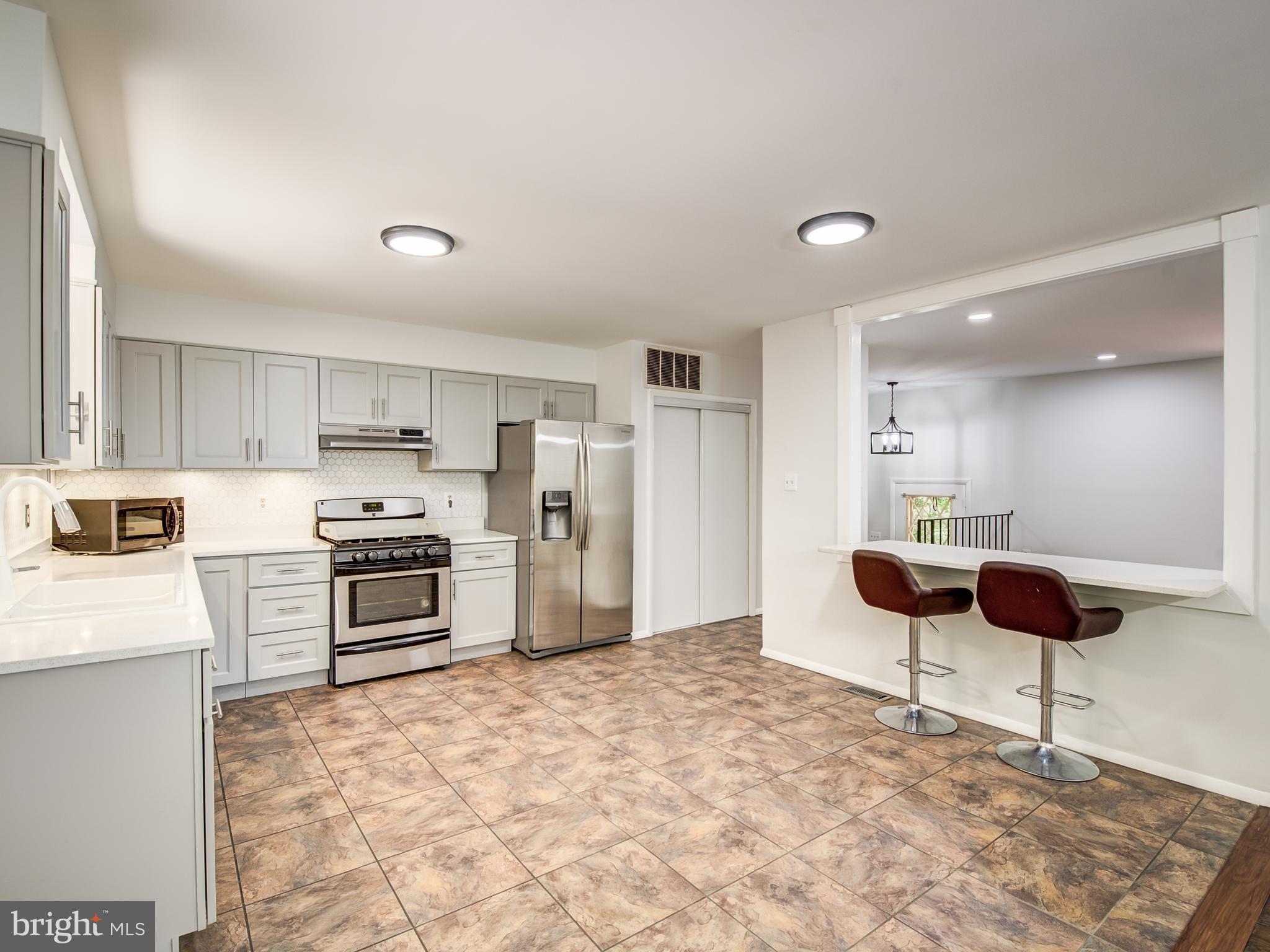 3330 Holland Cliffs Road Huntingtown, MD 20639 - Photo 13 of 64 Kitchen w/Breakfast Bar