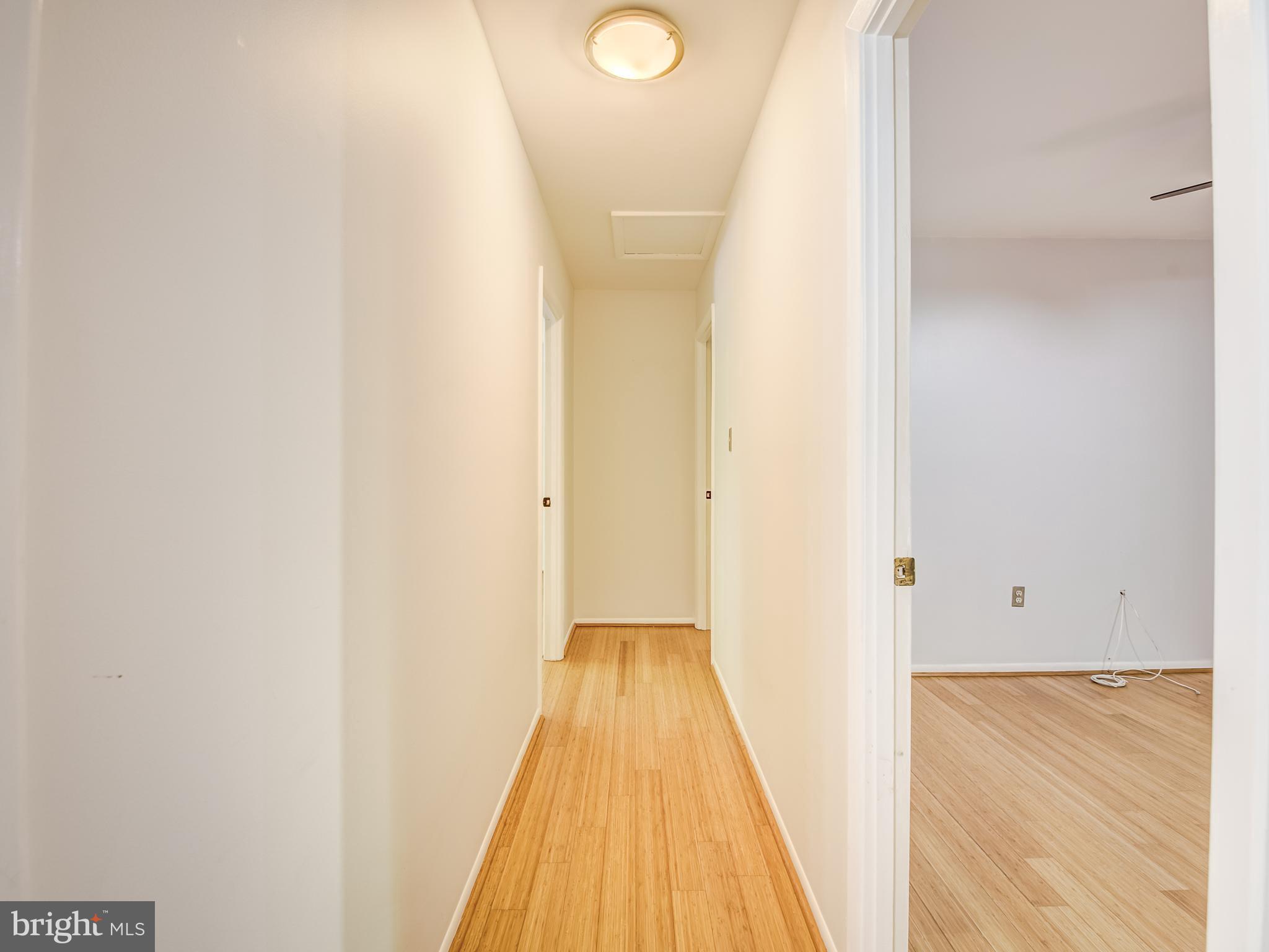 3330 Holland Cliffs Road Huntingtown, MD 20639 - Photo 15 of 64 Hallway to 3 Bedrooms all Bamboo flooring