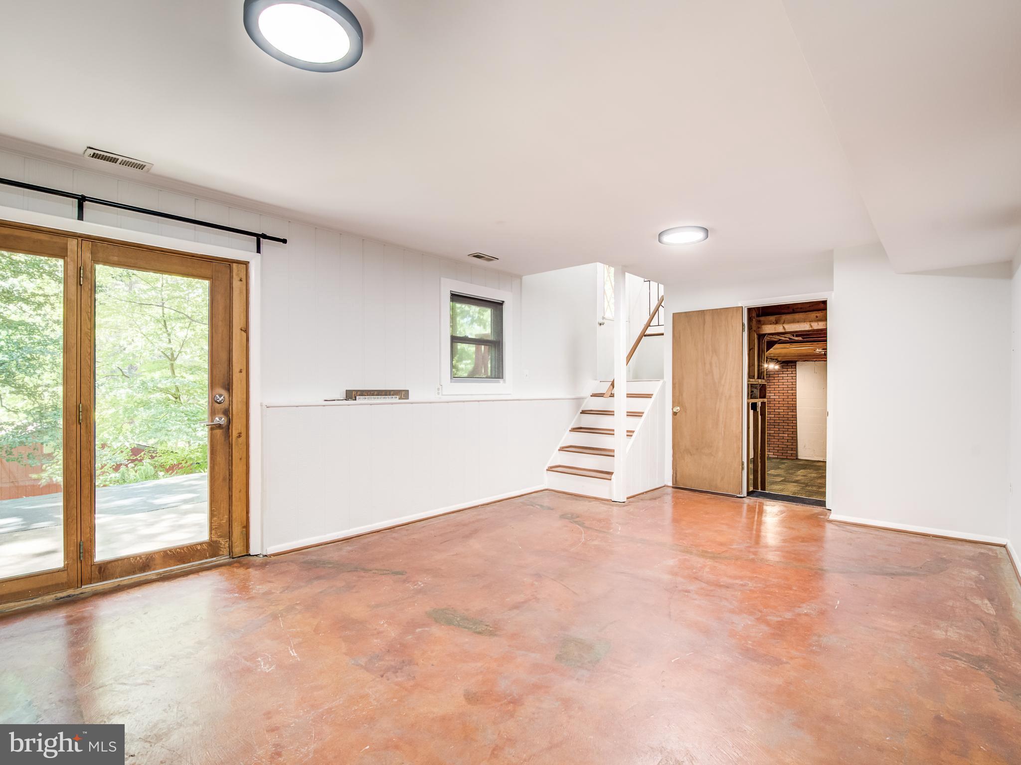 3330 Holland Cliffs Road Huntingtown, MD 20639 - Photo 23 of 64 Walk out level family room