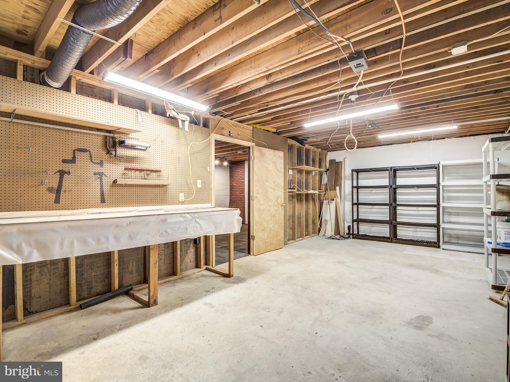 3330 Holland Cliffs Road Huntingtown, MD 20639 - Photo 34 of 64 abundant 4th level workshop/storage
