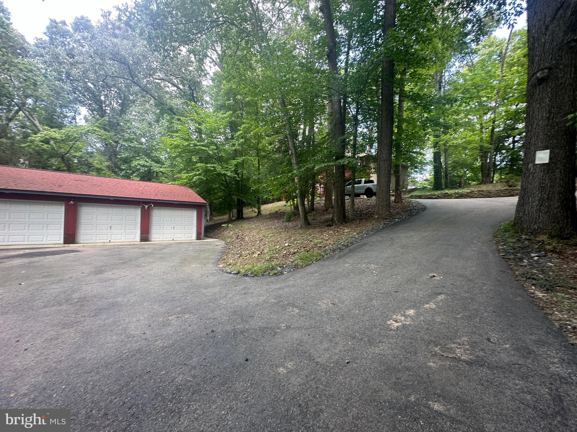 3330 Holland Cliffs Road Huntingtown, MD 20639 - Photo 44 of 64 Garage and House
