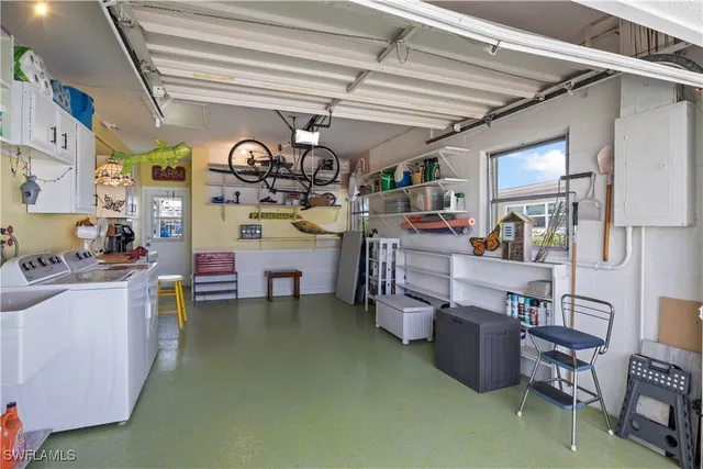a living room with furniture and a clock