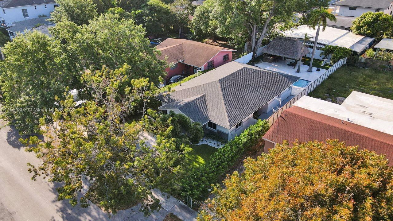 2800 Southwest 26th Street Miami, FL 33133 - Photo 21 of 72 an aerial view of a house with a yard and garden