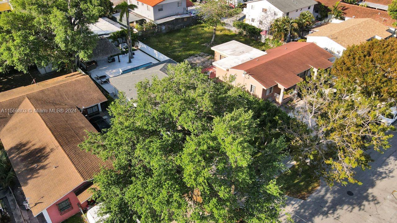 2800 Southwest 26th Street Miami, FL 33133 - Photo 27 of 72 an aerial view of a house with yard and outdoor seating