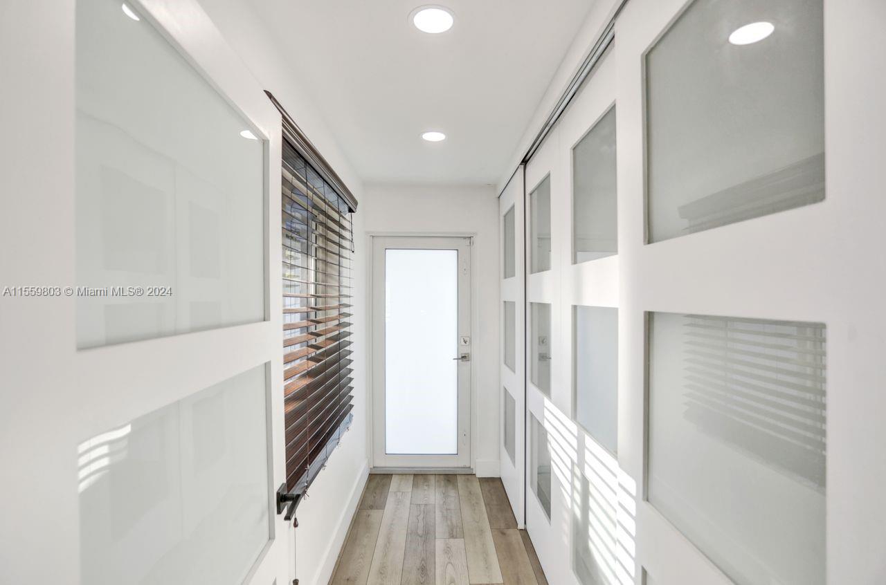 2800 Southwest 26th Street Miami, FL 33133 - Photo 3 of 72 a view of hallway with stairs